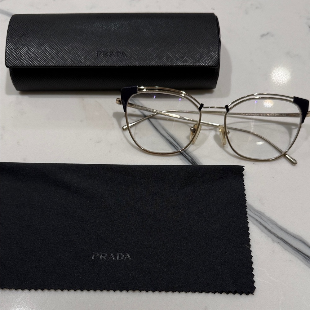 Prada Women's Glasses with Gold Frame